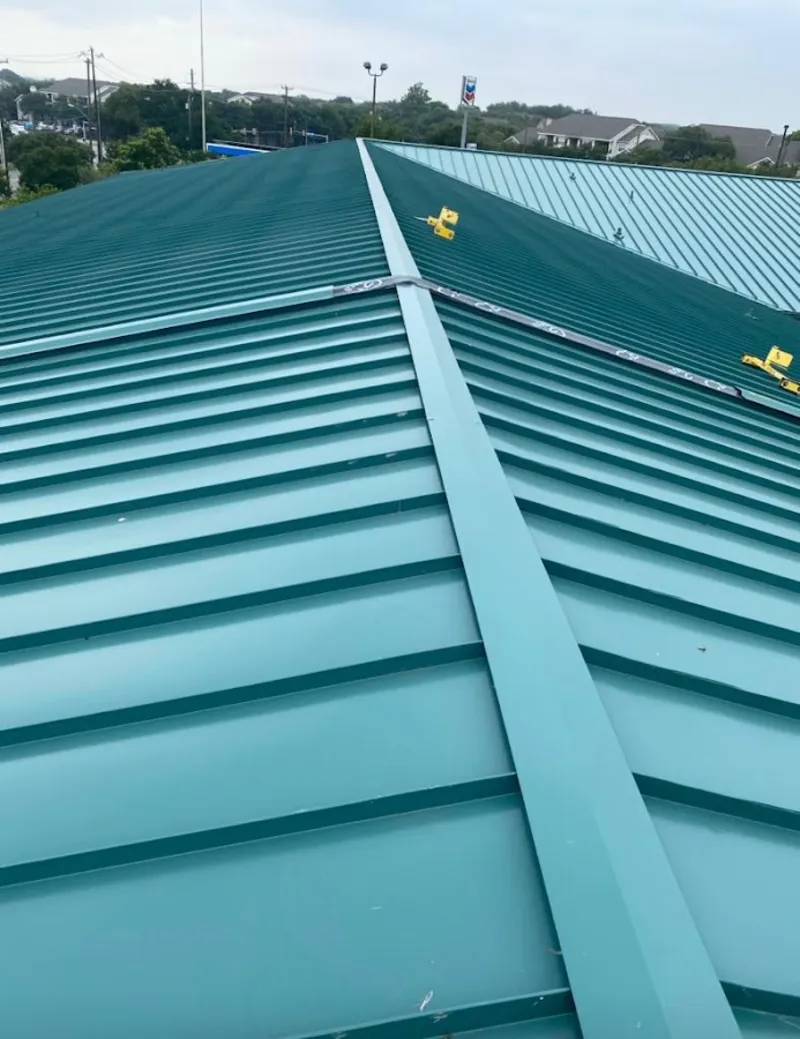 Green commercial metal roof ridge and valley for Metal Roof Repair in Huntington Park